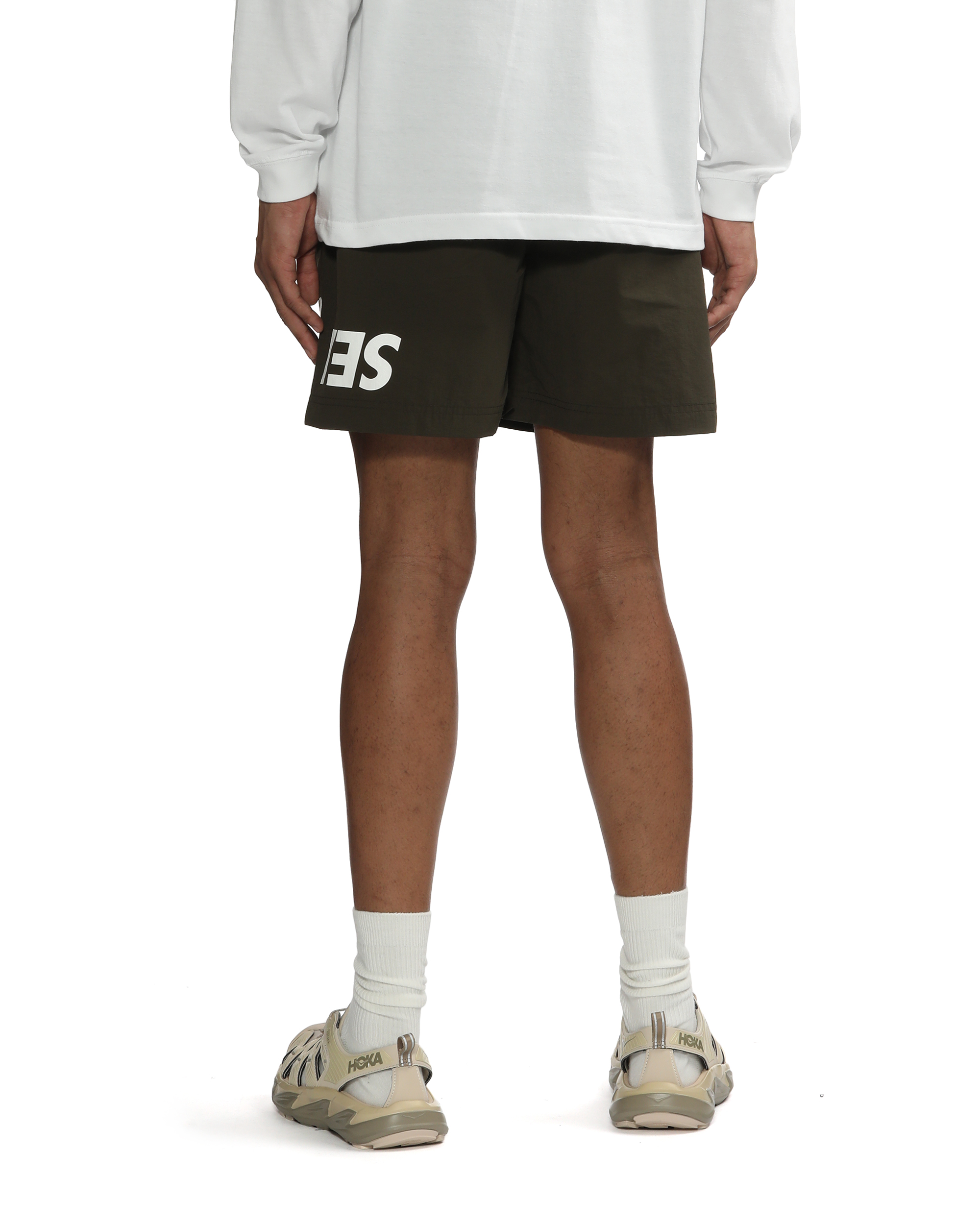 X WIND AND SEA nylon shorts