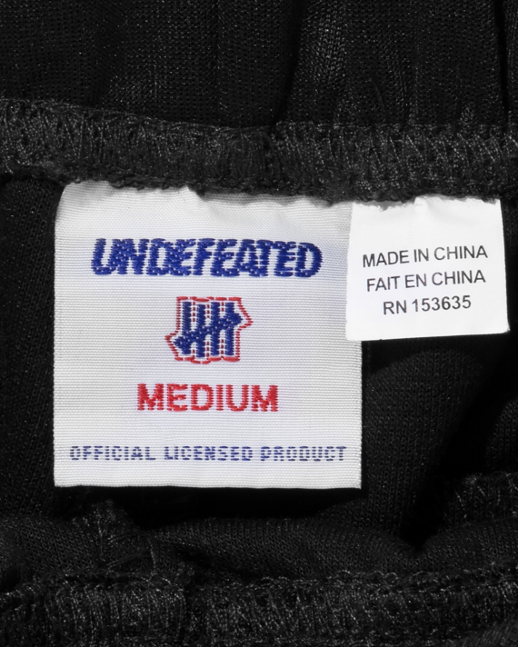 UNDEFEATED Straight logo pants